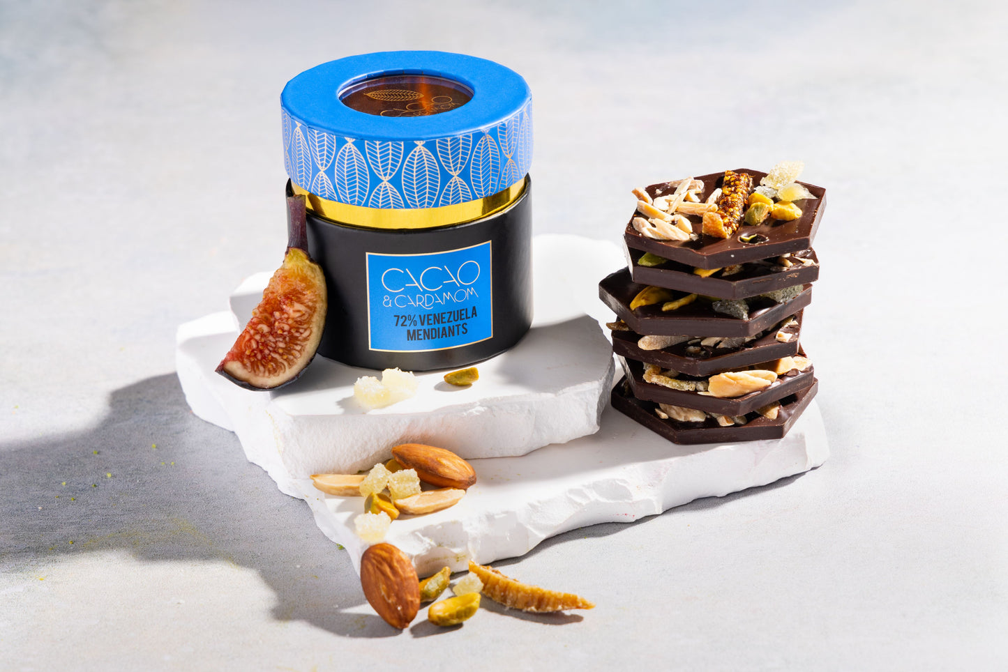 Close-up of 72% Venezuelan dark chocolate mendiants with artisan toppings.