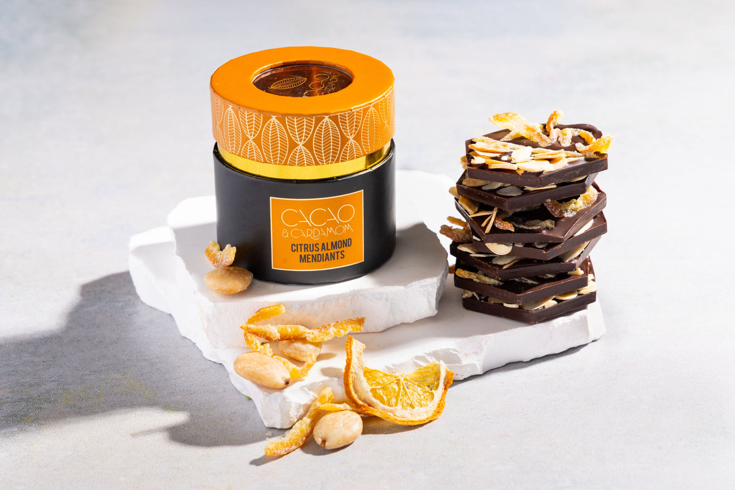 Close-up of Citrus Almond Mendiants with roasted almonds and premium chocolate.