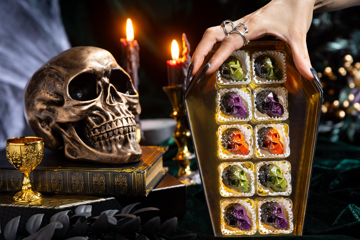 Open Death by Chocolate Coffin Box 10-piece displaying handcrafted gourmet chocolates.