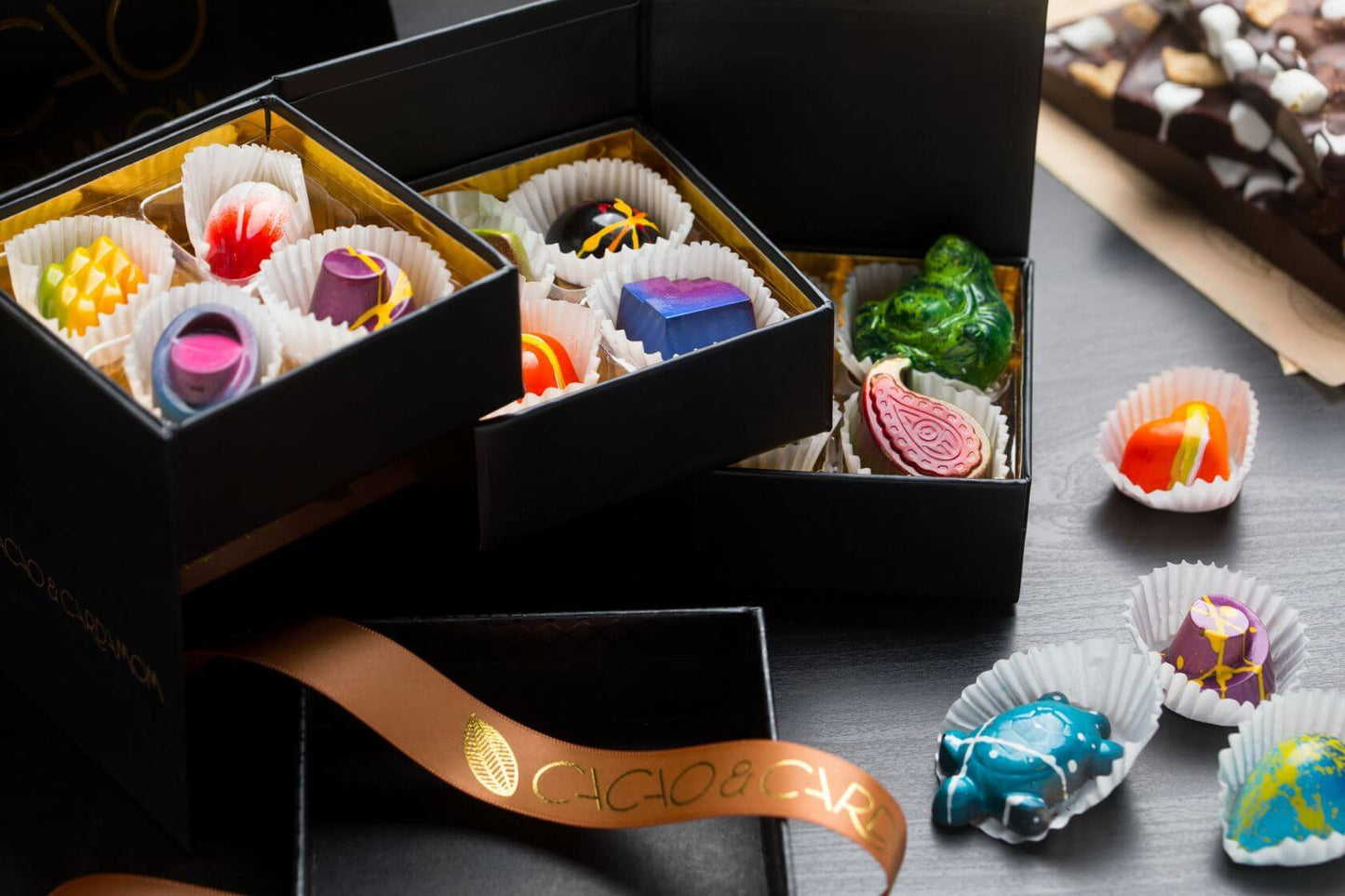 Three Tier Dozen Signature Collection 12-piece artisan chocolates beautifully presented for luxury gifting.