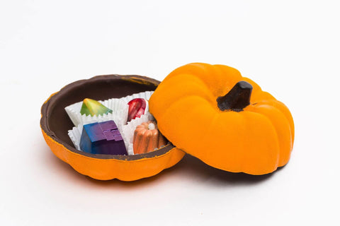 Why giving out chocolates for Halloween is a tradition?