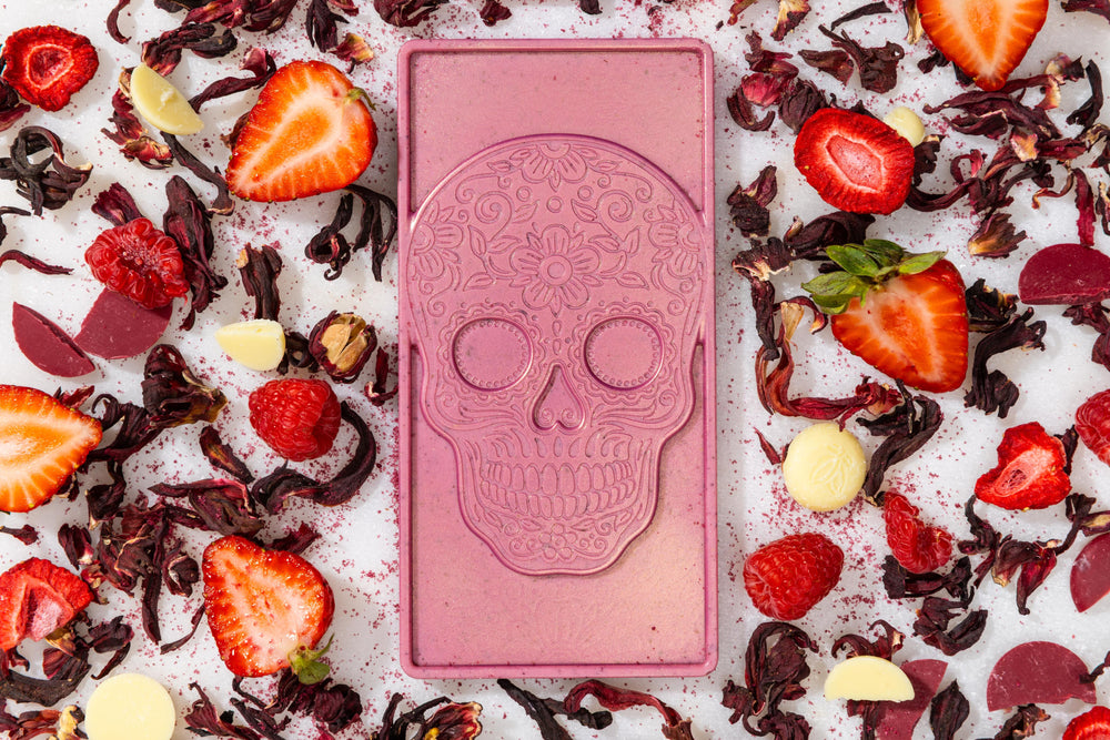 Unwrapped Berry Hibiscus artisan chocolate bar displaying handcrafted gourmet chocolate.