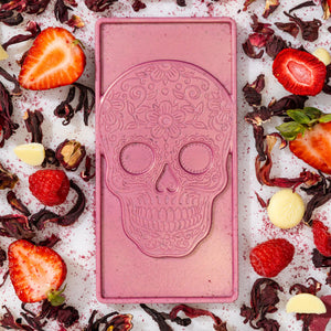 Unwrapped Berry Hibiscus artisan chocolate bar displaying handcrafted gourmet chocolate.