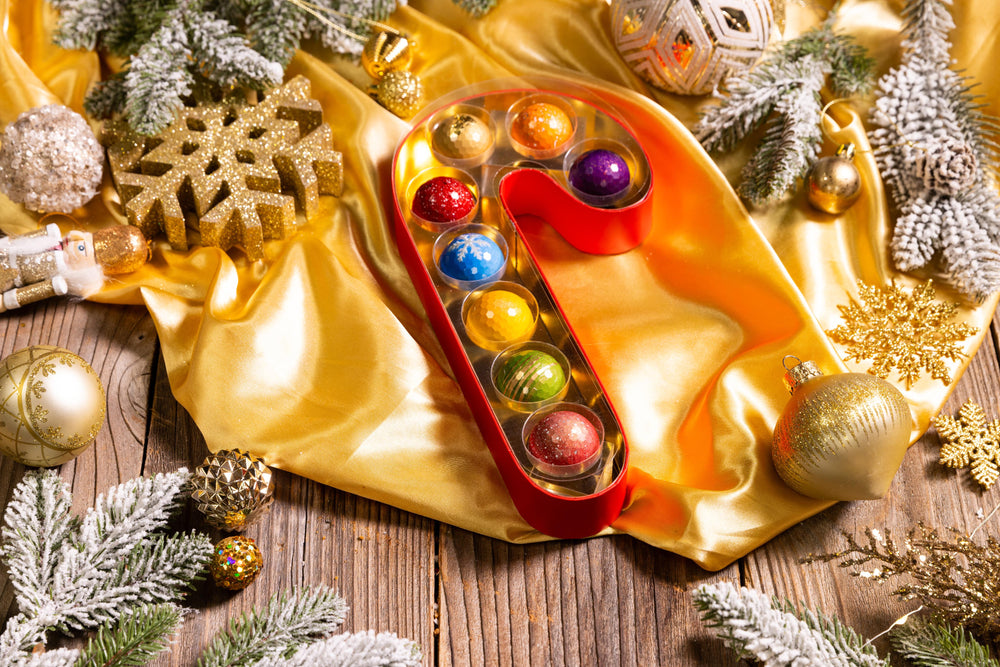 Candy Cane Confections 8-piece featuring handcrafted artisan chocolates inspired by festive candy cane flavors by Cacao & Cardamom.