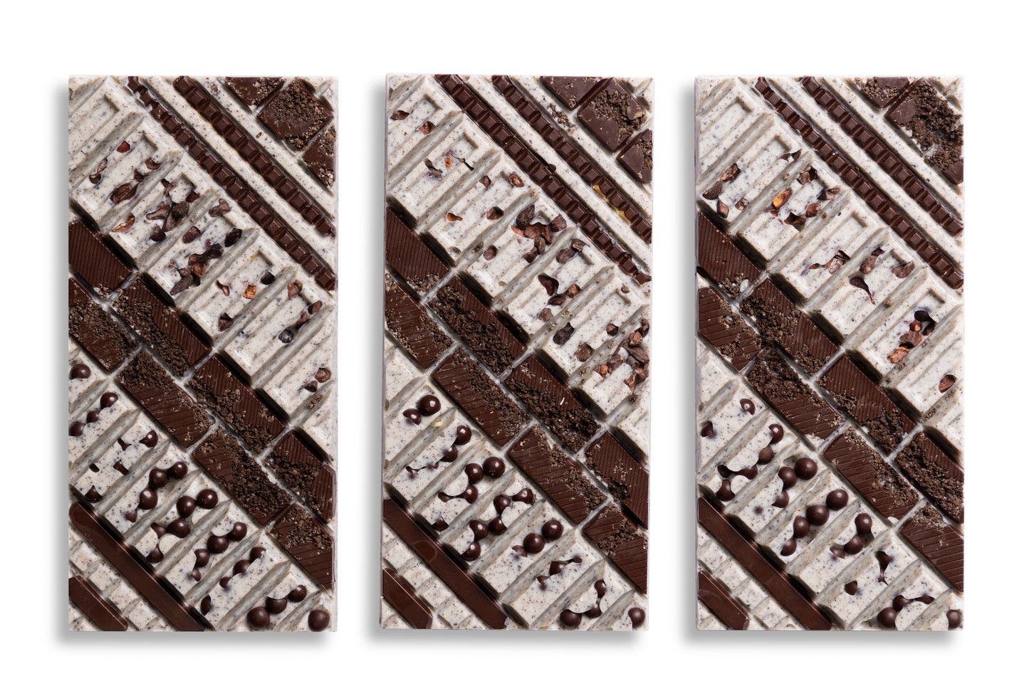 Close-up of the Cookies & Cream Artisan Bar with crunchy cookie pieces.