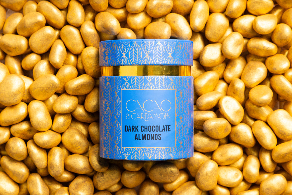 Close-up of Dark Chocolate Almond dragees coated in rich dark chocolate.