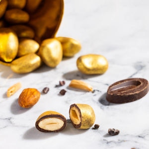 Open Dark Chocolate Almond dragees displaying premium chocolate-coated almonds.