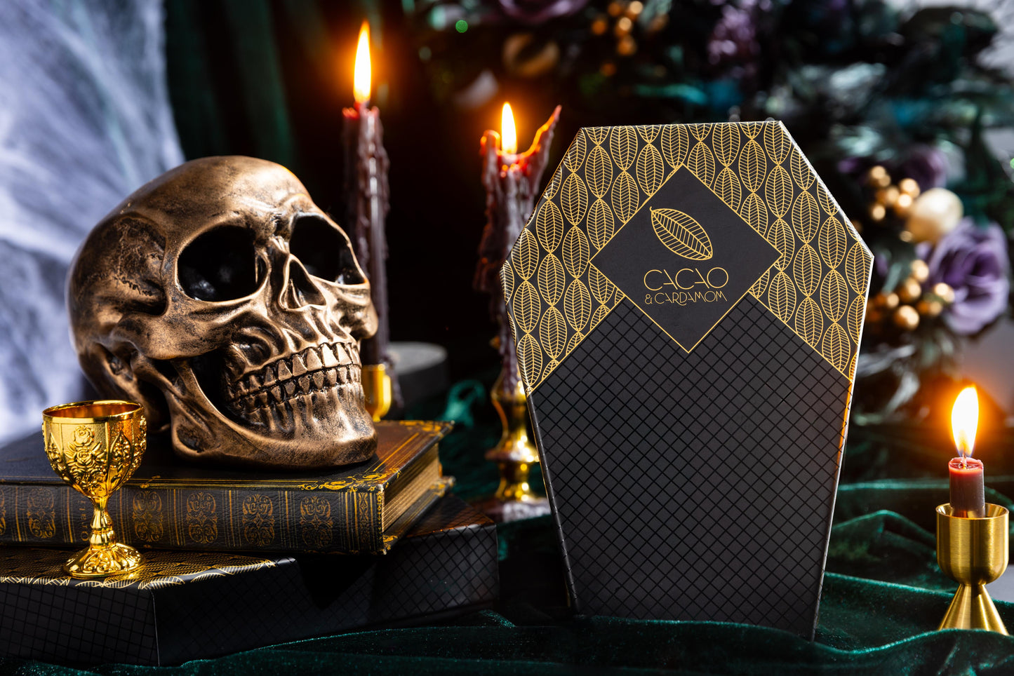 Death by Chocolate Coffin Box 10-piece featuring handcrafted artisan chocolates in a Halloween-themed coffin gift box by Cacao & Cardamom.