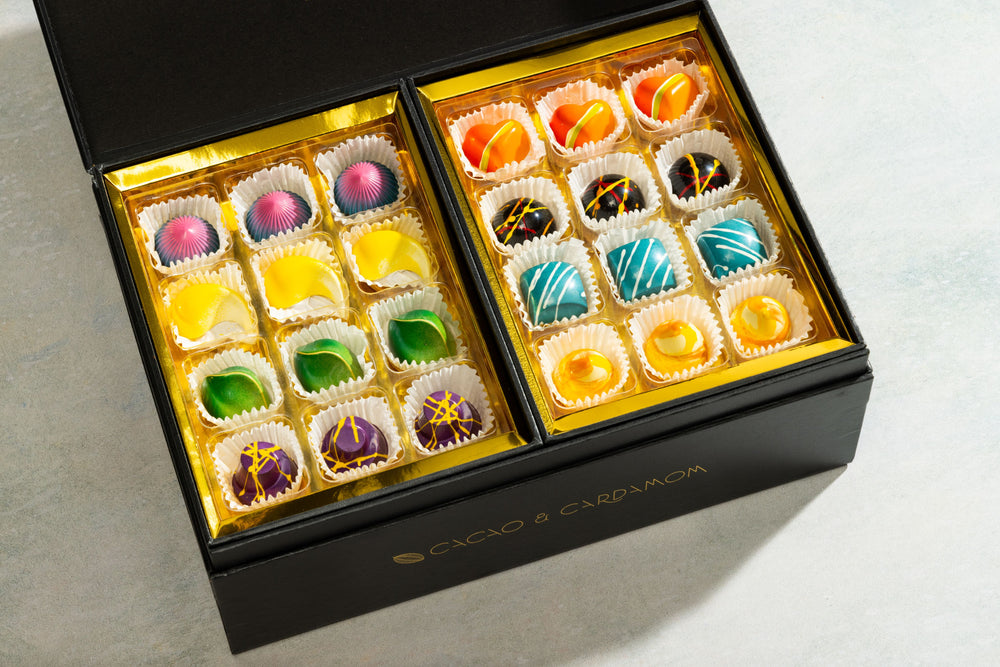 Close-up of handcrafted artisan chocolates from the Deluxe Chocolate Gift Box.