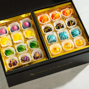 Close-up of handcrafted artisan chocolates from the Deluxe Chocolate Gift Box.