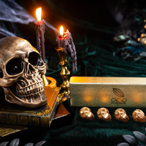 Gianduja Skulls 5-piece featuring handcrafted skull-shaped artisan chocolates by Cacao & Cardamom.