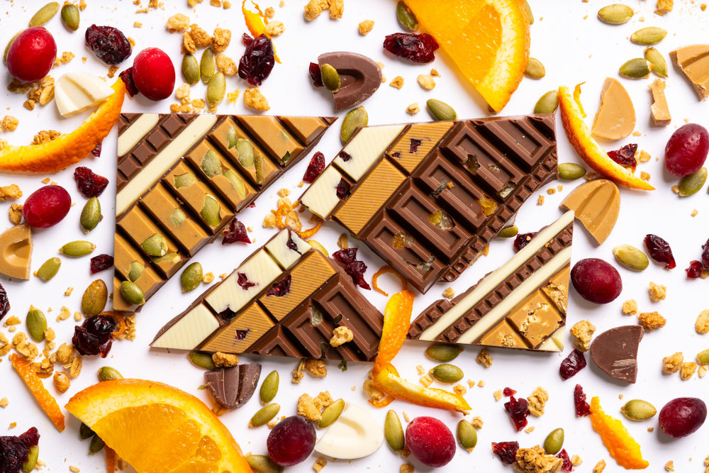 Unwrapped Harvest Crunch Artisan Bar displaying handcrafted gourmet chocolate.