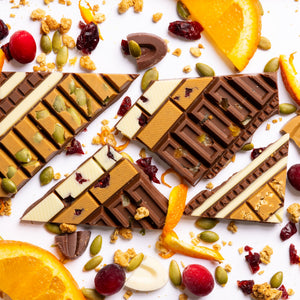 Unwrapped Harvest Crunch Artisan Bar displaying handcrafted gourmet chocolate.