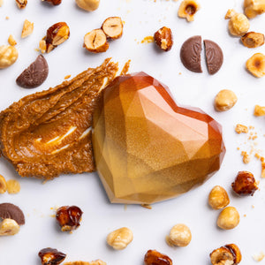 A heart-shaped dark chocolate bar with hazelnut speculoos spread