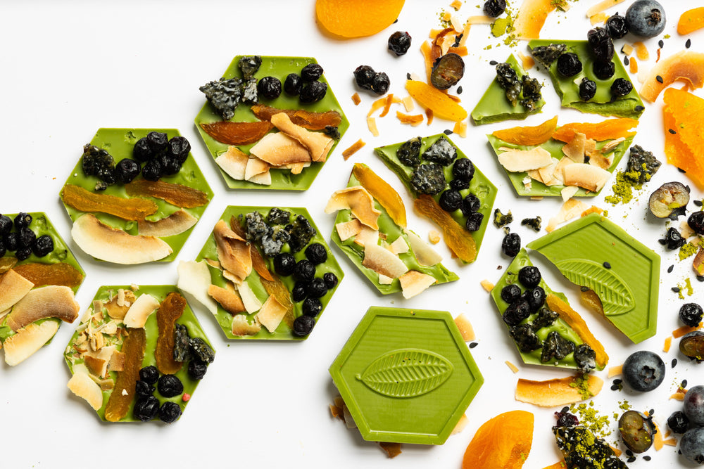 Matcha Mendiants featuring handcrafted artisan chocolate discs infused with premium matcha and gourmet toppings.