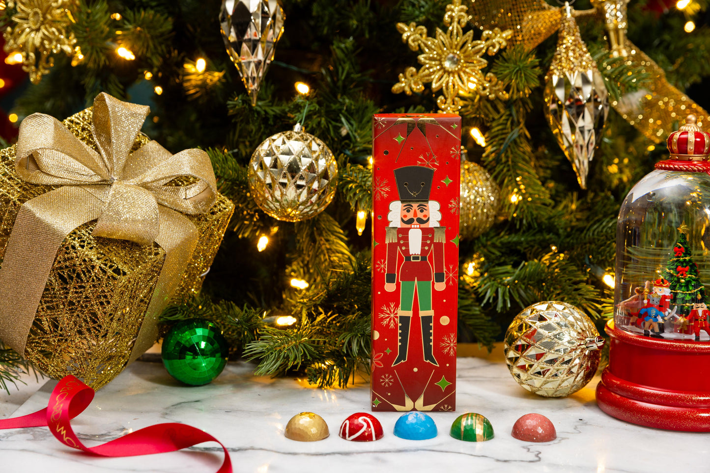 Petite Nutcracker 5-piece featuring handcrafted festive chocolates in a luxury Christmas gift box by Cacao & Cardamom.