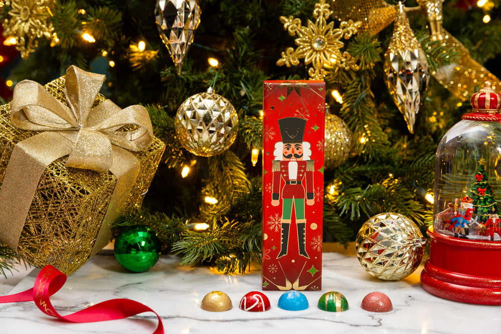 Petite Nutcracker 5-piece featuring handcrafted festive chocolates in a luxury Christmas gift box by Cacao & Cardamom.