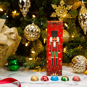 Petite Nutcracker 5-piece featuring handcrafted festive chocolates in a luxury Christmas gift box by Cacao & Cardamom.