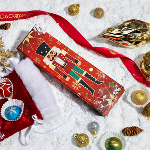 Top view of the Petite Nutcracker 5-piece showcasing handcrafted artisan chocolates arranged in a festive gift box.