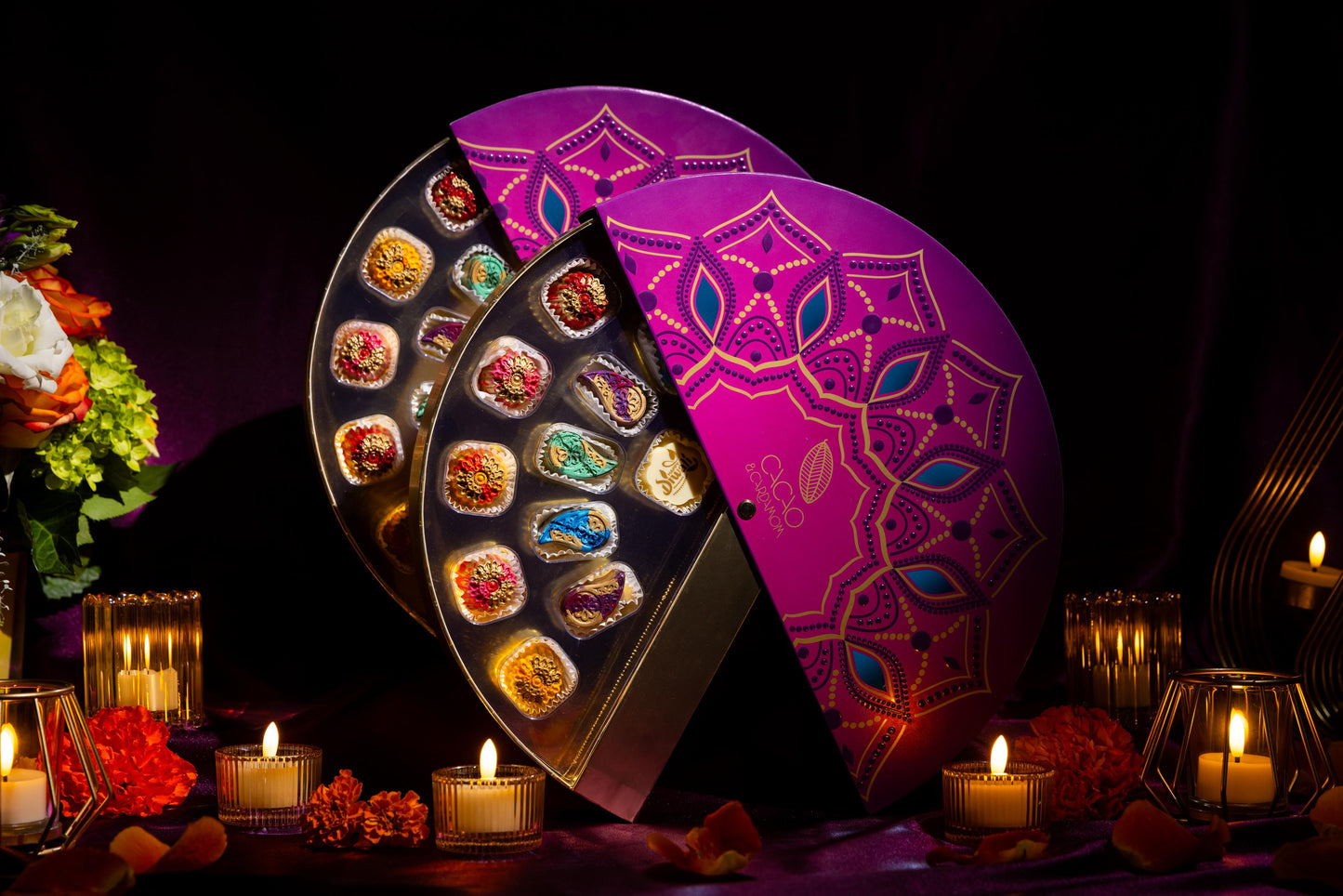 Top view of the Rangoli Gift Box 14-piece assortment showcasing handcrafted gourmet chocolates by Cacao & Cardamom.