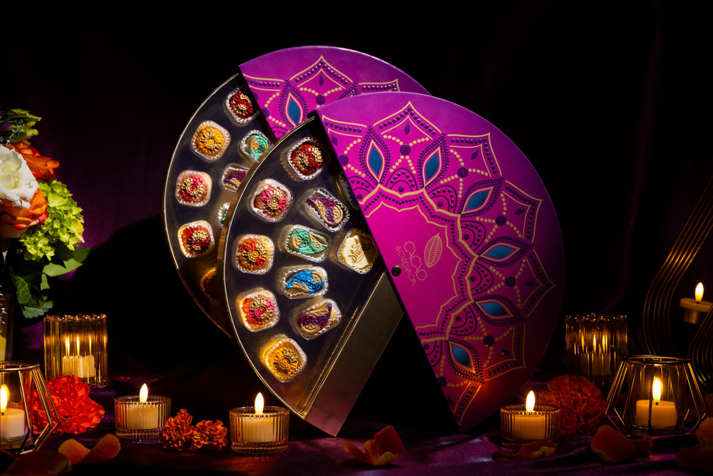 Top view of the Rangoli Gift Box 14-piece assortment showcasing handcrafted gourmet chocolates by Cacao & Cardamom.