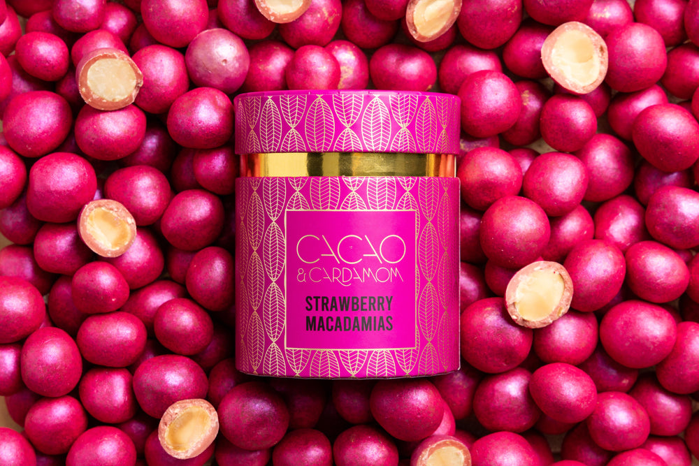 Strawberry Macadamia dragees beautifully presented for luxury gifting.
