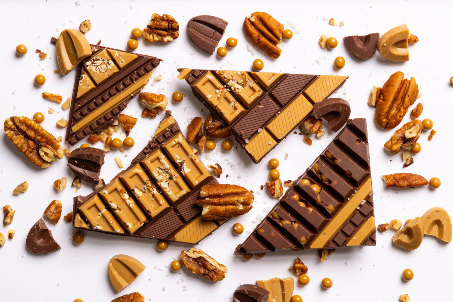 Unwrapped Texas Pecan Artisan Bar displaying handcrafted gourmet chocolate.