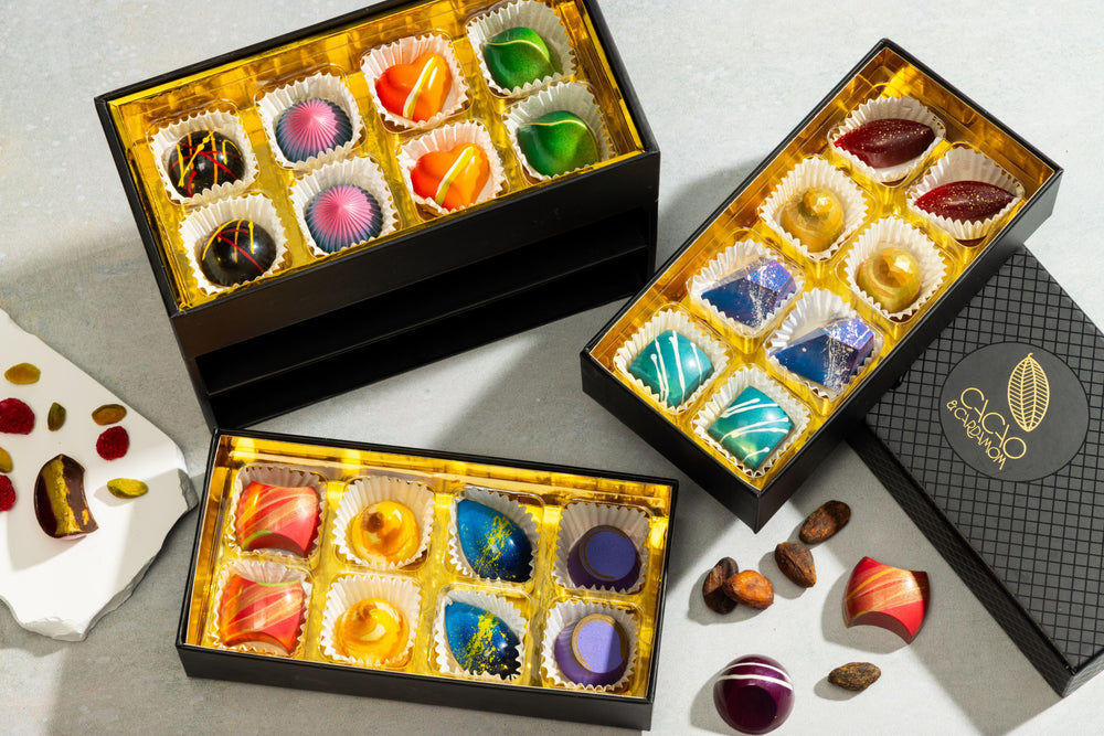 Open The Jewelry Box 24-piece displaying handcrafted gourmet chocolates.