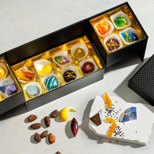 Open The Perfect Selection gift box displaying handcrafted gourmet chocolates.