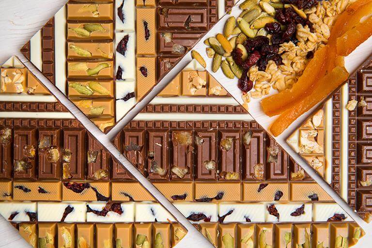 Harvest Crunch Artisan Bar featuring handcrafted premium chocolate with crunchy seasonal ingredients.