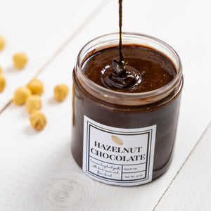 Open jar of Hazelnut Chocolate Spread showcasing its rich and creamy texture.